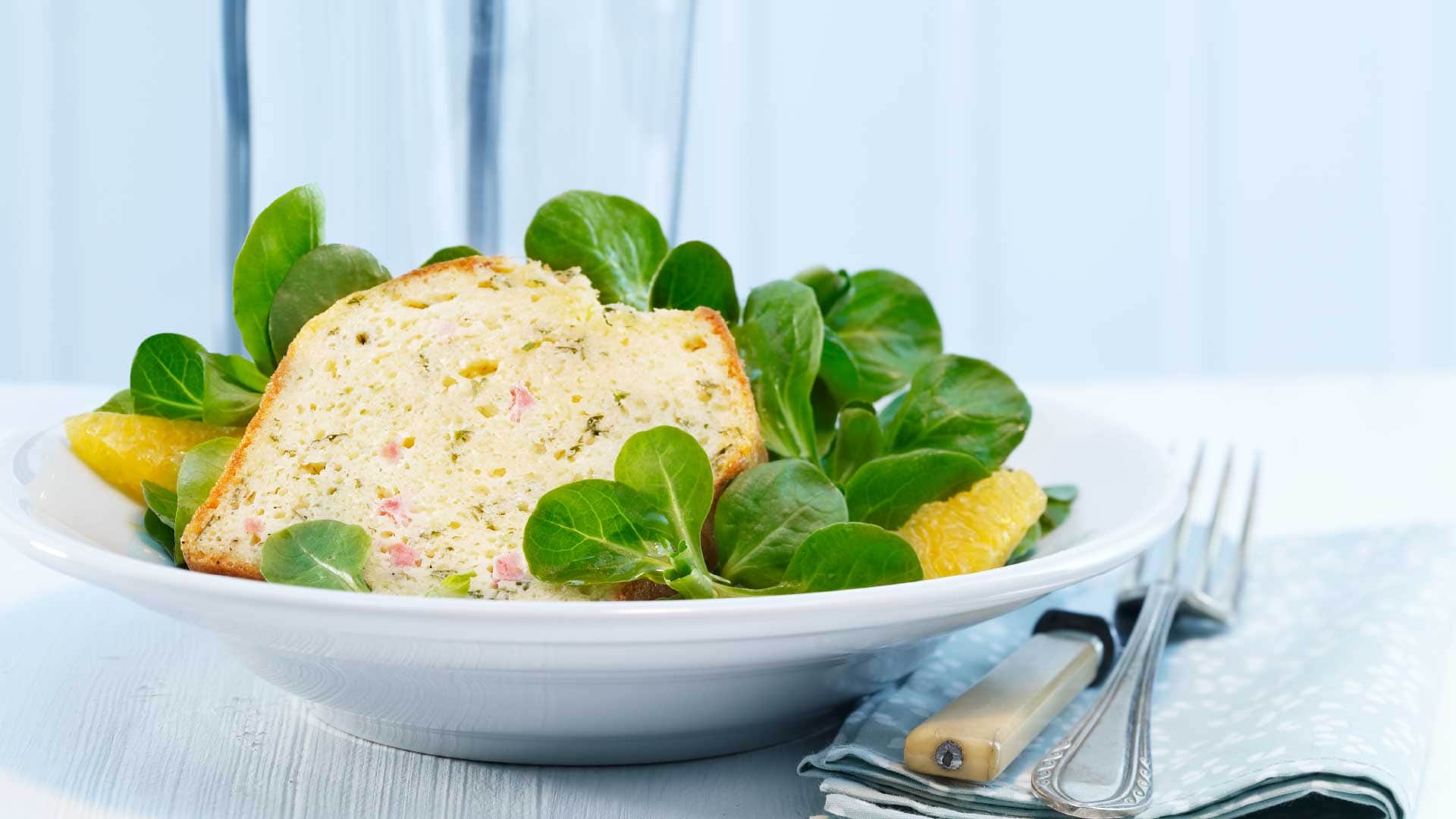 Cheesecake with lamb's lettuce and orange salad - Emmentaler AOP Switzerland
