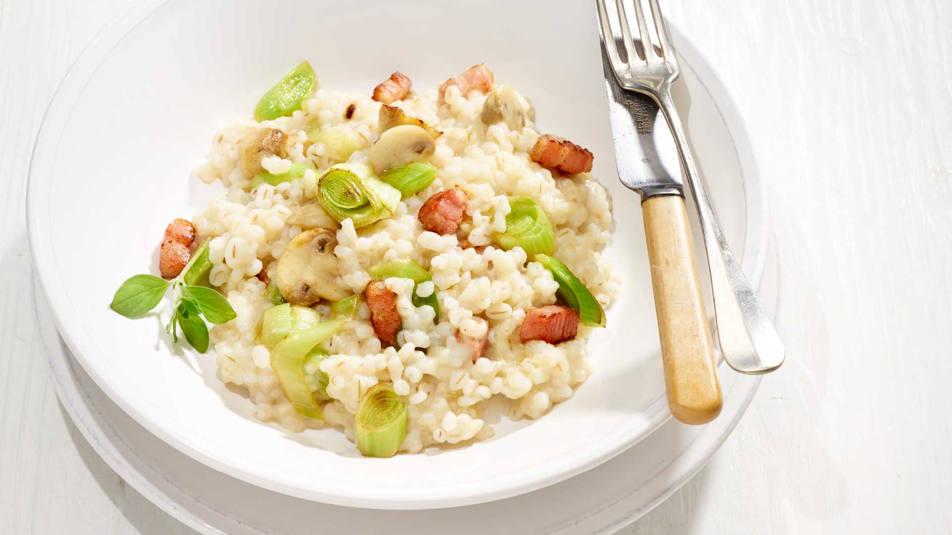 Barley risotto with mushrooms and leek - Emmentaler AOP Switzerland