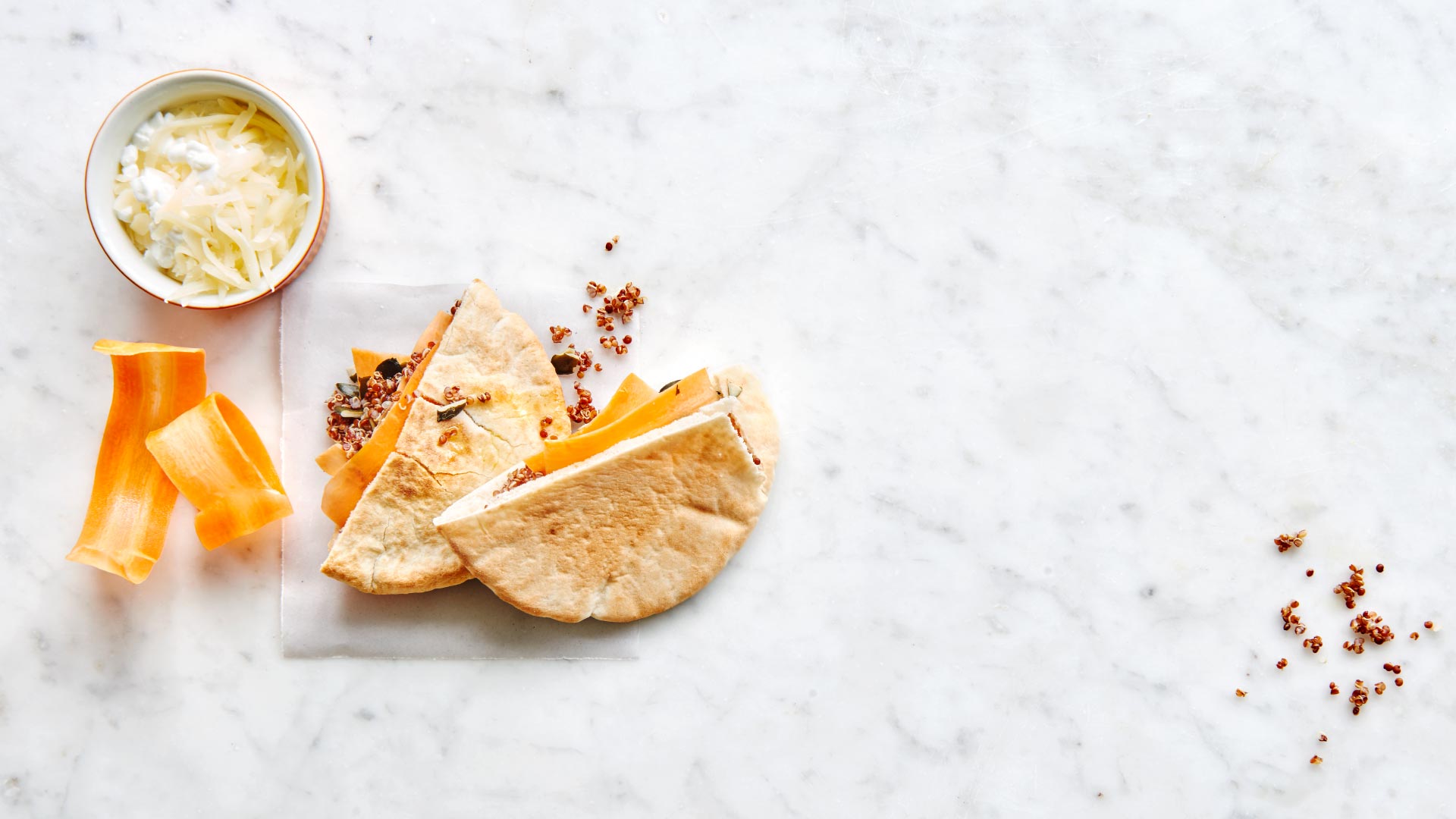 Pitta bread with quinoa, carrots and pumpkin seeds - Emmentaler AOP Switzerland