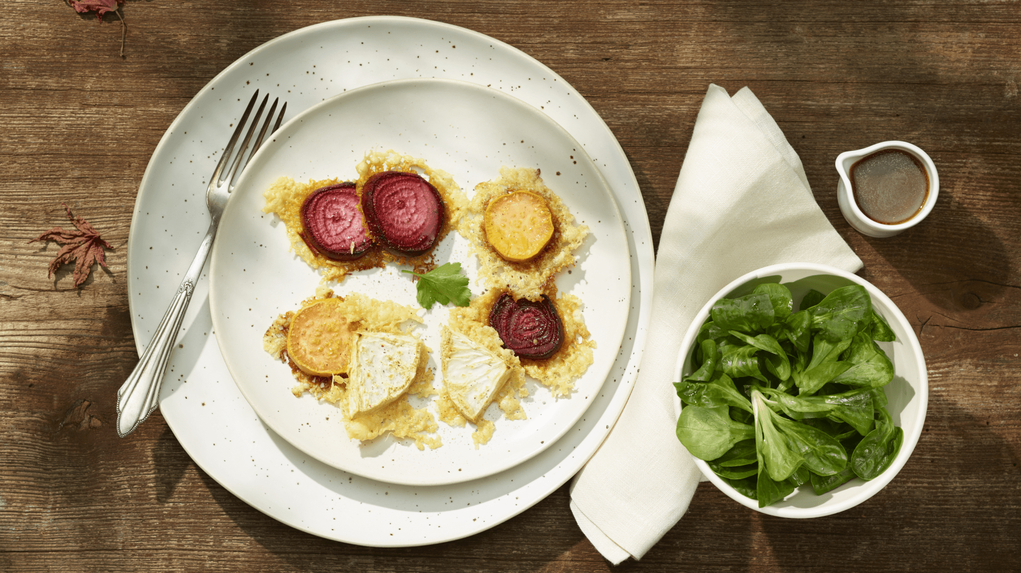 Vegetables on crispy cheese with a salad of horseradish & lamb’s lettuce - Emmentaler AOP Switzerlan